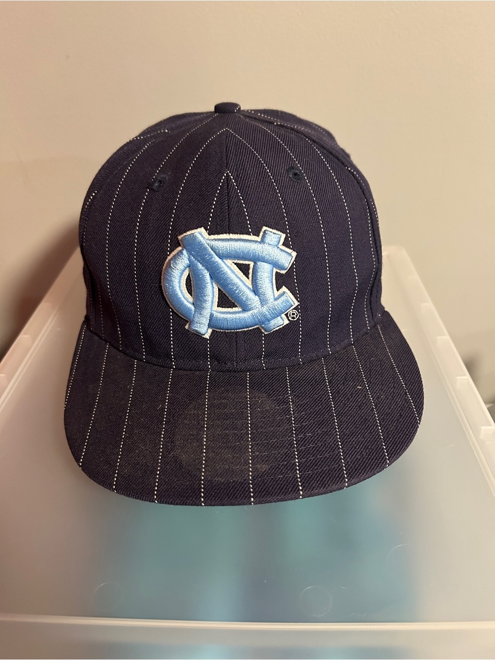 New Era Navy Pinstripe Hat with Light Blue NC Logo